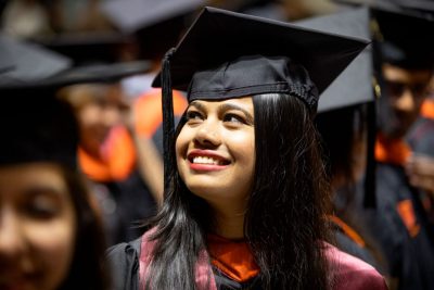 Close up of a graduate during a graduation ceremony.