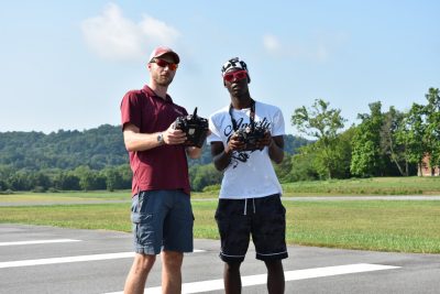 student & instructor flying drones