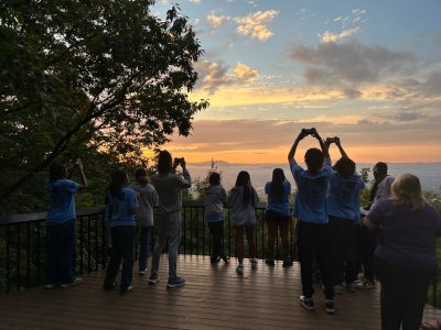 students taking sunset photos