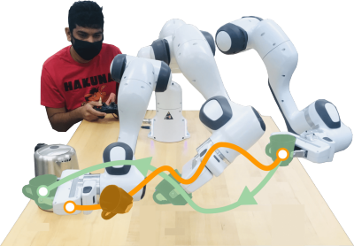 student working with robot arm