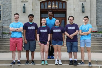 CEED students standing in front of Burruss Hall.