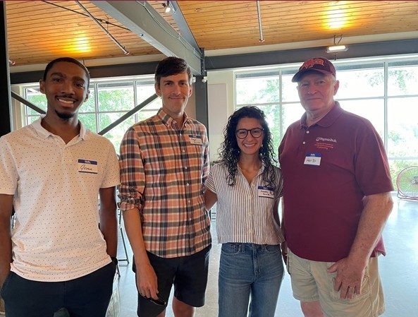 Alumni at a happy hour event