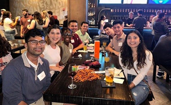 Alumni at a happy hour event