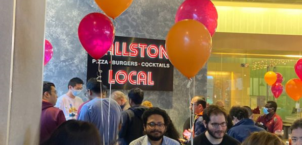 Alumni gather for a happy hour at Ballston Local