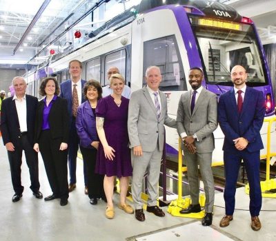 Alumni Martha Gross (second from the left) and Doran Bosso (at right) are both part of the team working on the Purple Line transit system in Maryland.