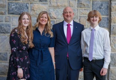 Ian Rehmert (second to right), his wife, Katherine (second to left), and their two children.