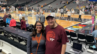 Cherye Moore ‘95 (at left) and Stephen Moore ‘95 at the Virginia Tech women’s basketball 2023 Final Four game in Dallas, TX. 