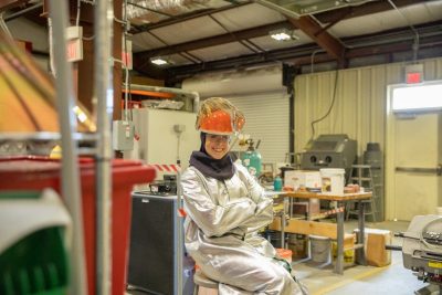 College of Engineering Senior Victoria Rambo inside Virginia Tech's Kroehling Advanced Materials Foundry.