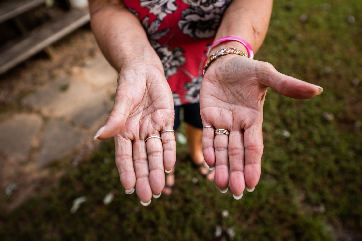 A photo of a woman's hands outstretched.