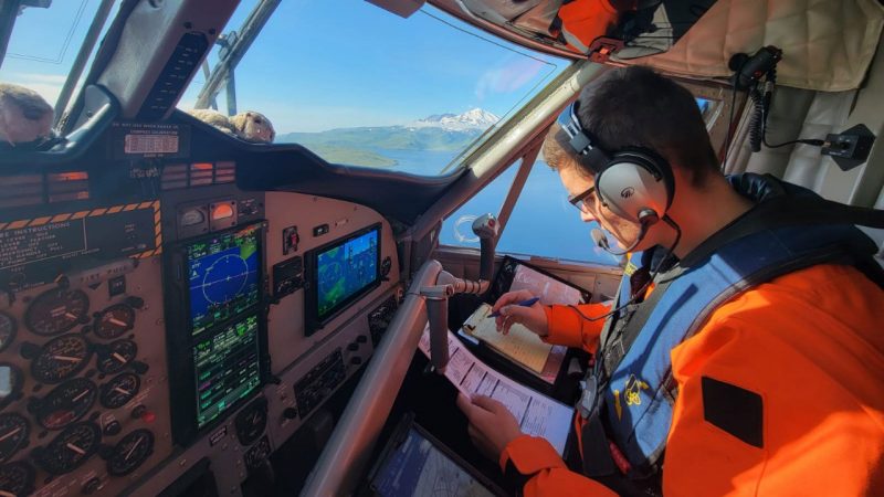 Thomas Smith piloting a plane.