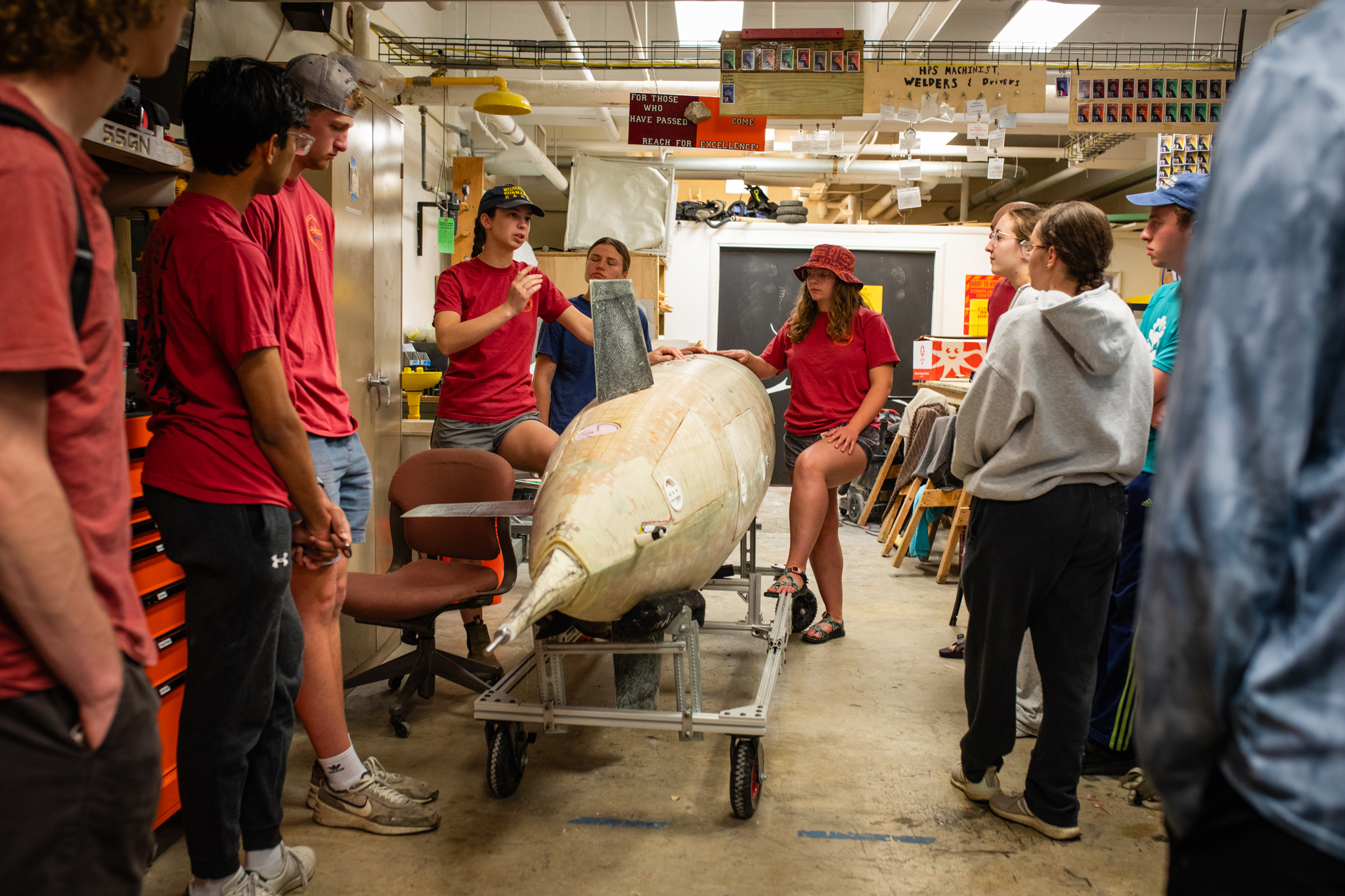 The human powered sub team in their lab preparing for a day of testing at the pool.