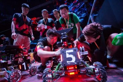 Robogrinder team members working on their robot.