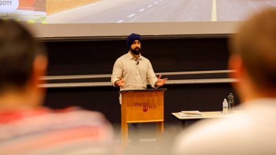 Harjas Singh ‘15 speaks to a classroom full of computer science students