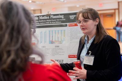 At the Major Design Expo, Haley Rindfleisch explains her capstone project, Robotic Motion Planning, sponsored by PrimeVision.