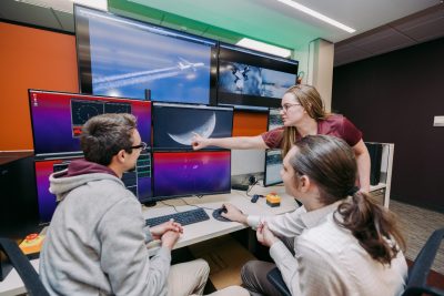 Virginia Tech students Gavin Saul, Rose Stanphill, and Connor Thornhill use the Virginia Tech National Security Institute’s Space Domain Awareness Telescope. 