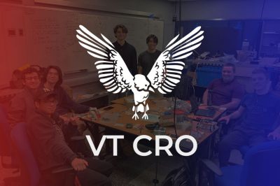VT-CRO logo over a photo of the team at work.
