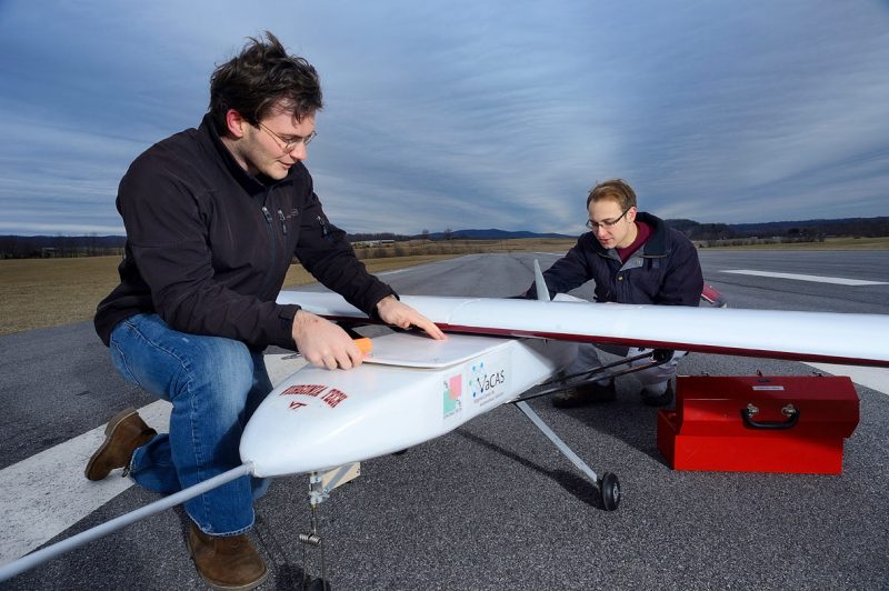 Students with an aircraft