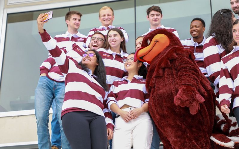 Dean's Team students taking a selfie with the hokie bird