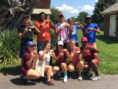 Clark Scholars posing together making a VT with their fingers