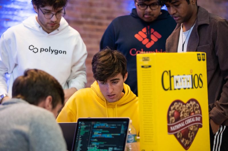Students coding at Lionhack.
