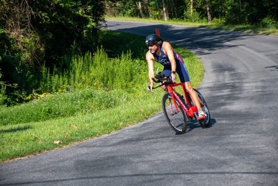 Chris Roy on a bike during a triathlon.