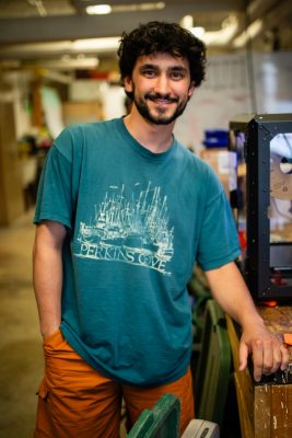 Charlie Giglio poses for a photo in their lab.