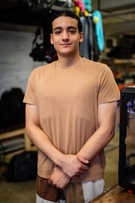 Karim Lahrim poses for a photo in their lab.