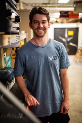 Ben Keenan poses for a photo in their lab.