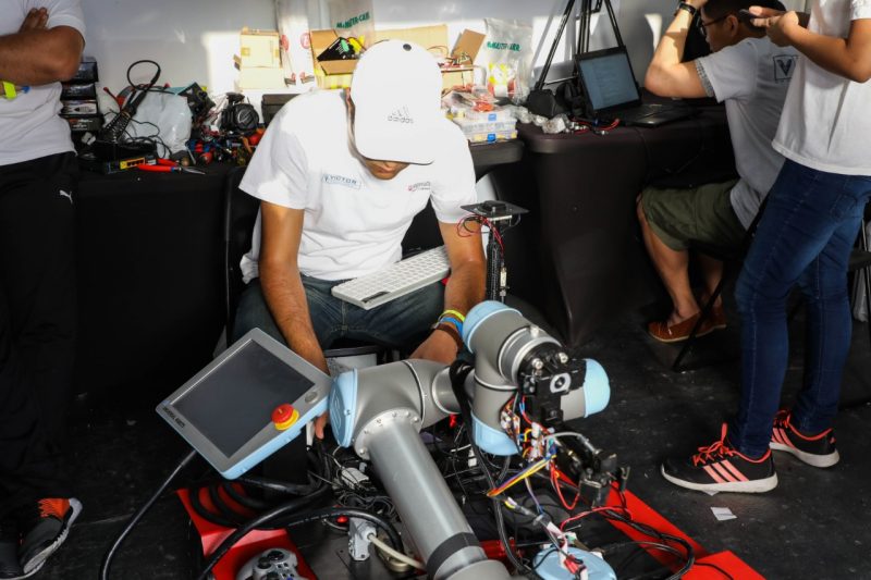 Graduate student working on an autonomous robot