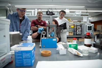 faculty and students in the lab