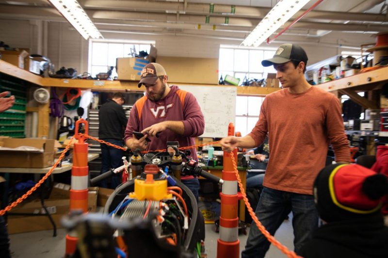 Students working on the BOLT motorcycle team.